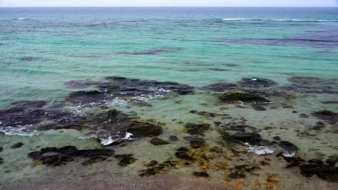 Download Free Video Stock Small Sea Waves And Clear Water Live Wallpaper