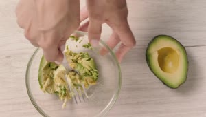 Free Video Stock Smashing Avocado In A Bowl Live Wallpaper