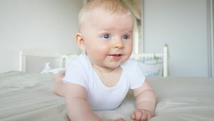 Free Video Stock Smiling Baby On His Bed Live Wallpaper