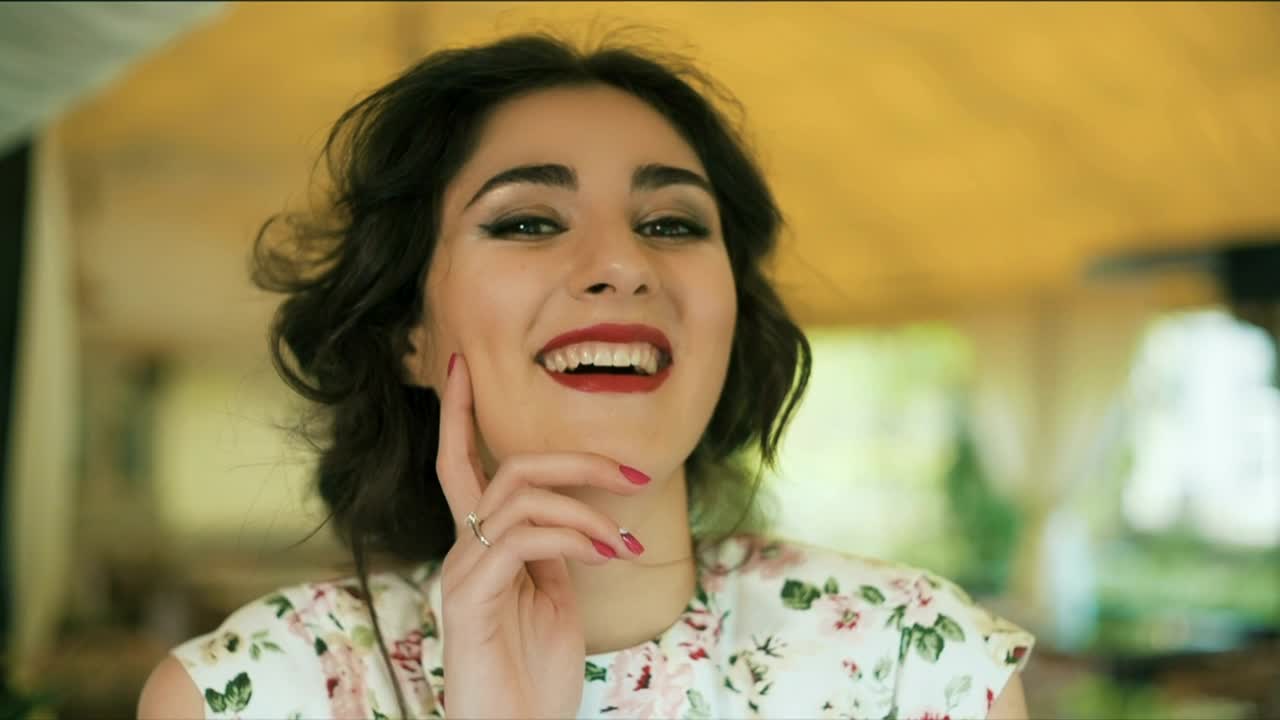 Download Free Video Stock Smiling Woman Looking At Camera Live Wallpaper