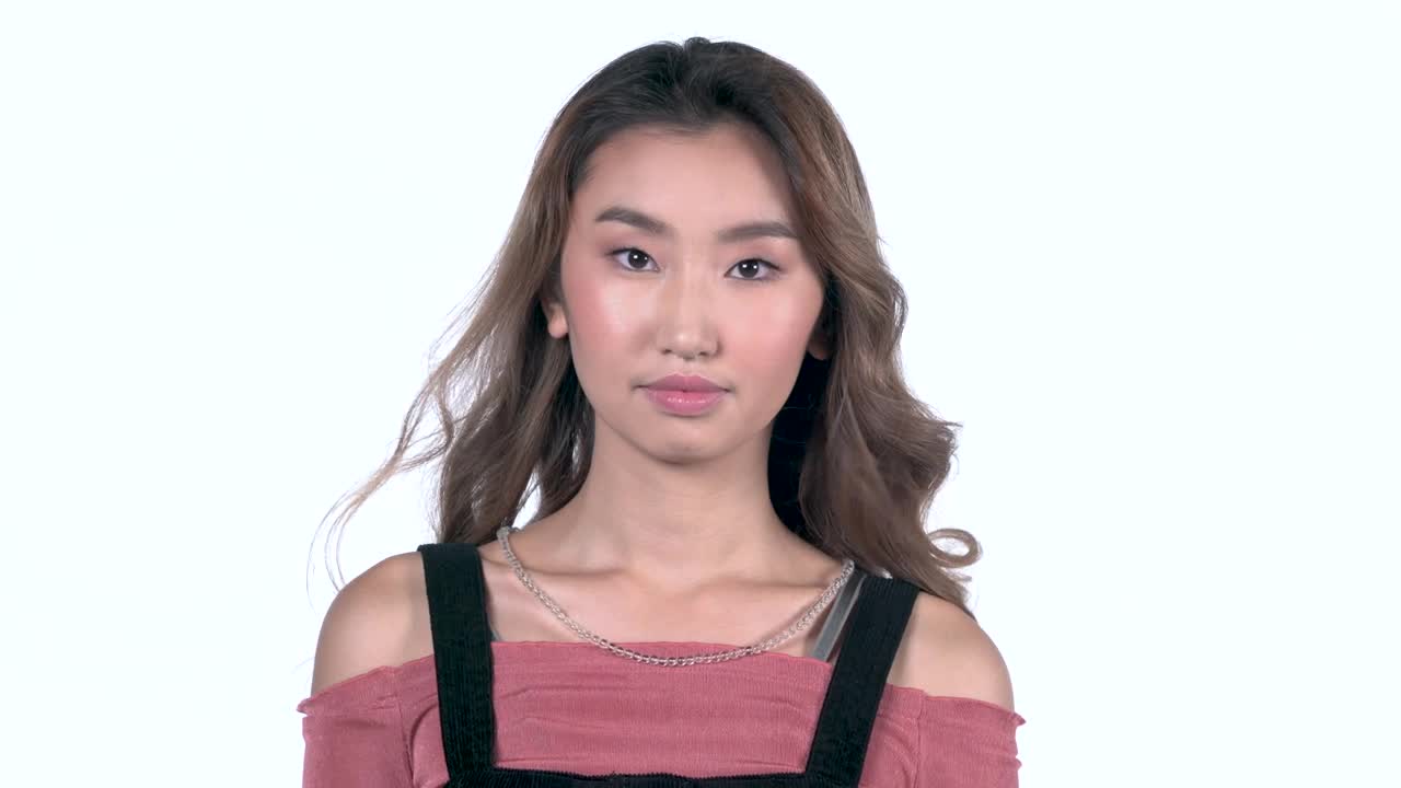 Download Free Video Stock Smiling Woman With A White Background Live Wallpaper