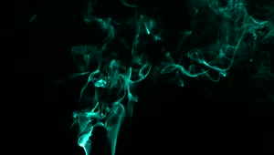 Free Video Stock Smoke With Fluorescent Particles On Black Background Live Wallpaper