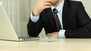 Free Video Stock Smoking Office Worker In Front Of Computer Live Wallpaper