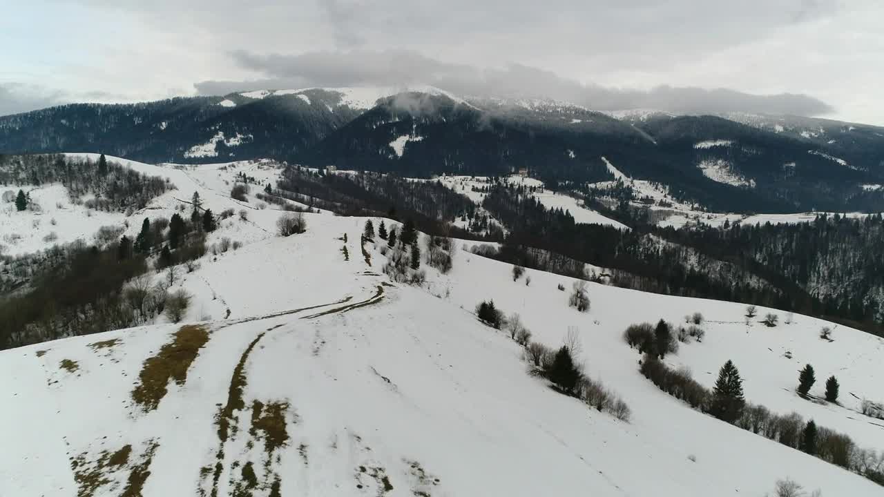 Download Free Video Stock Snow Covered Hill In A Mountain Range Aerial Shot Live Wallpaper