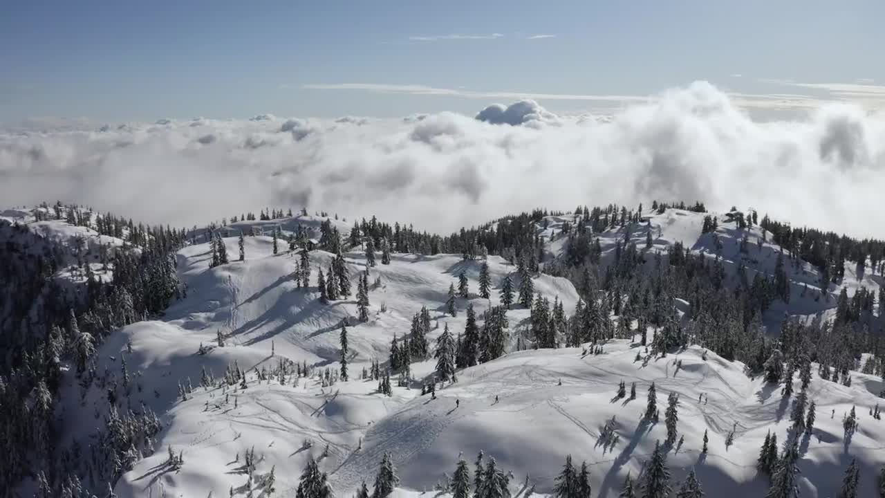 Download Free Video Stock Snow Covered Mountain Above The Clouds Live Wallpaper