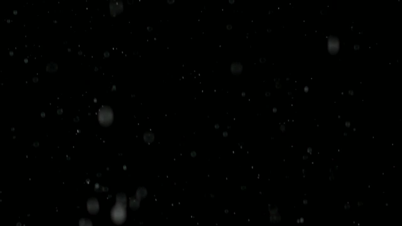 Download Free Video Stock Snow Falling Softly Against A Black Background Live Wallpaper
