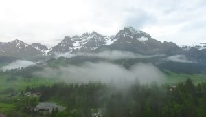 Free Video Stock Snow Topped Mountains And Mist Live Wallpaper