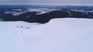 Free Video Stock Snowboarders Walking In The Snow Drone Shot Live Wallpaper