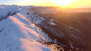 Free Video Stock Snowy Mountain Peak In The Sunset Live Wallpaper