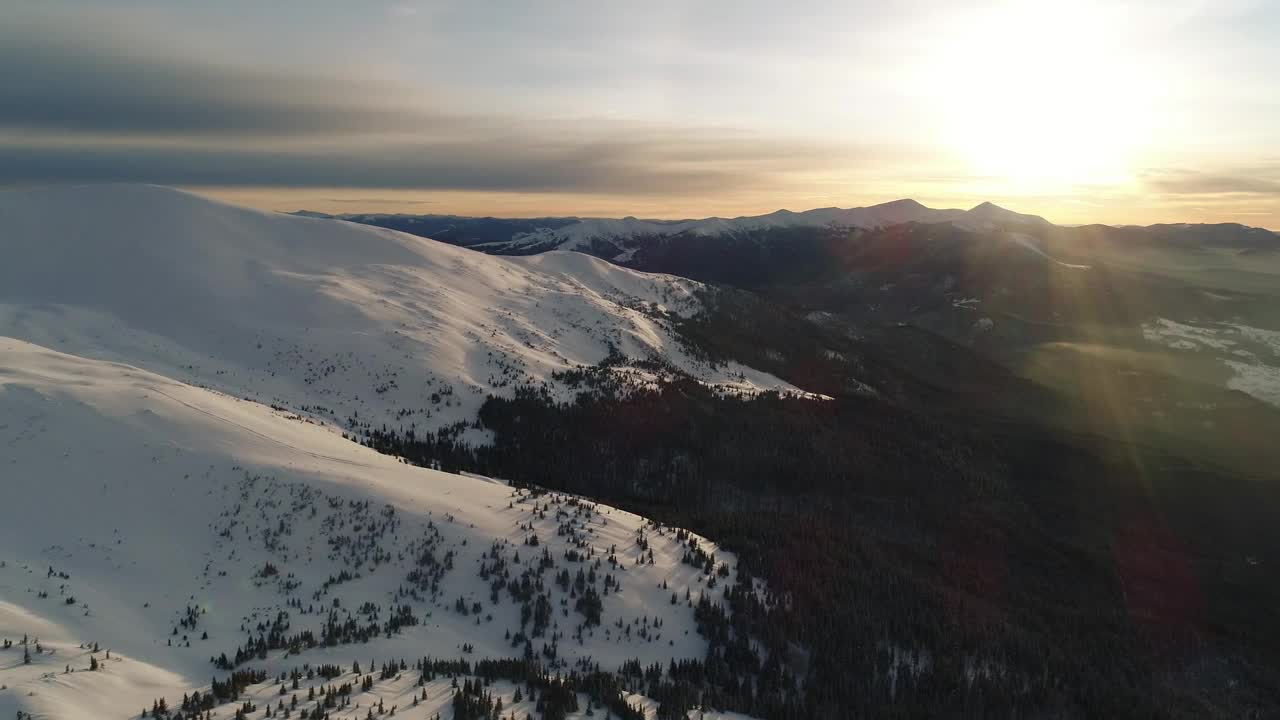 Download Free Video Stock Snowy Top Of Mountains At Sunset Aerial Shot Live Wallpaper