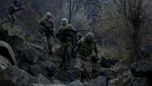 Free Video Stock Soldiers Walking Through The Rocks Live Wallpaper