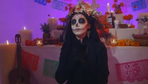 Download Free Video Stock Solemn Catrina Praying At The Foot Of An Altar Of Live Wallpaper
