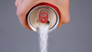 Free Video Stock Spilling White Sugar Falling Out Of A Soda Can Live Wallpaper