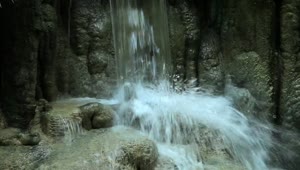Free Video Stock Splashing At The Base Of A Waterfall Live Wallpaper