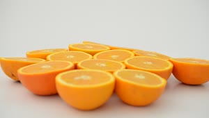 Free Video Stock Split Oranges Rotating On A White Background Live Wallpaper