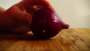 Free Video Stock Splitting A Purple Onion In Half Live Wallpaper