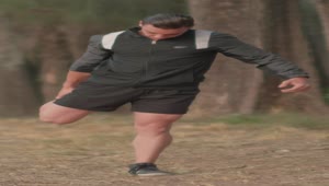 Free Video Stock Sporty Man Stretching In The Middle Of A Forest Live Wallpaper