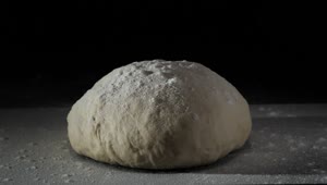 Free Video Stock Sprinkling Flour On Fresh Dough Live Wallpaper