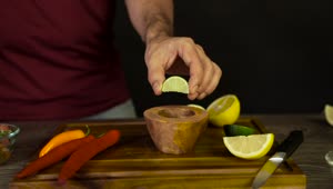 Free Video Stock Squeezing Lime Into A Bowl Live Wallpaper