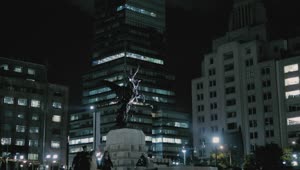 Free Video Stock Statue In A City Square Downtown At Night Live Wallpaper