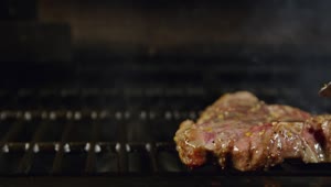 Free Video Stock Steak Cooking Over Flames Live Wallpaper