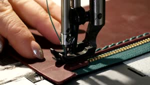 Free Video Stock Stitching A Wallet Using A Sewing Machine Live Wallpaper