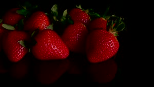 Free Video Stock Strawberries On A Dark Table Live Wallpaper