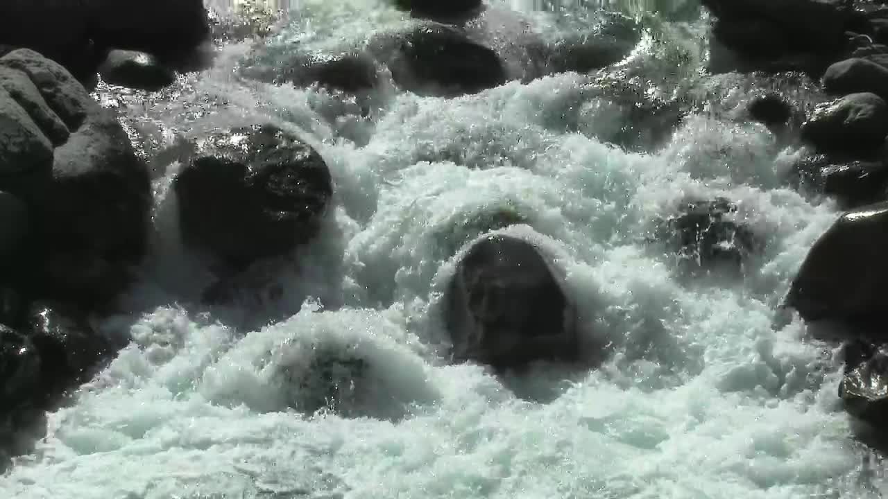 Download Free Video Stock Stream Flowing Between The Rocks Live Wallpaper