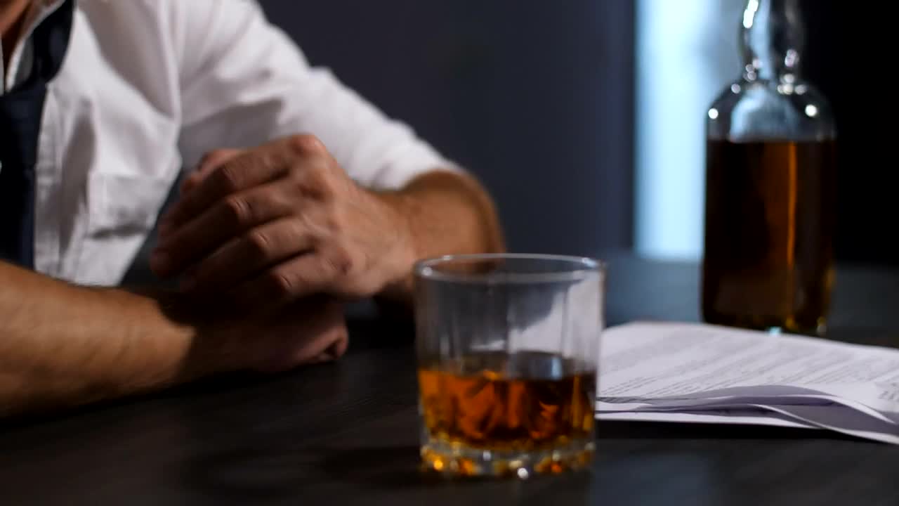 Download Free Video Stock Stressed Man Turning To Drink Live Wallpaper