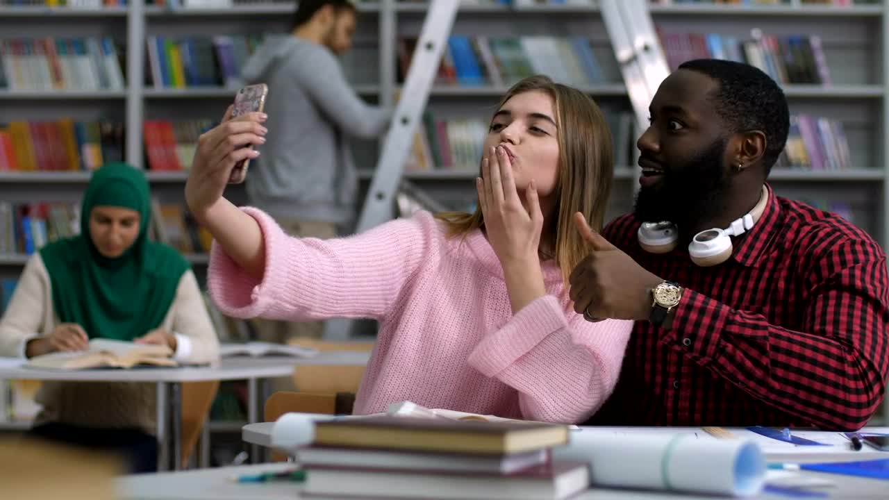 Download Free Video Stock Students Taking A Photo Instead Of Working Live Wallpaper