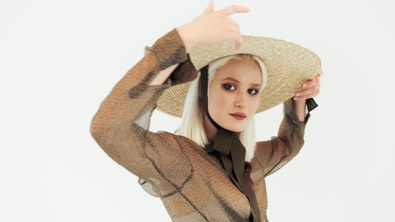 Download Free Video Stock Studio Shot Of Fashion Model Posing On White Background Live Wallpaper