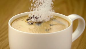 Free Video Stock Sugar Falling Into A Cup Of Coffee Live Wallpaper