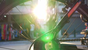 Free Video Stock Sun Flare Through A Bike Wheel Live Wallpaper