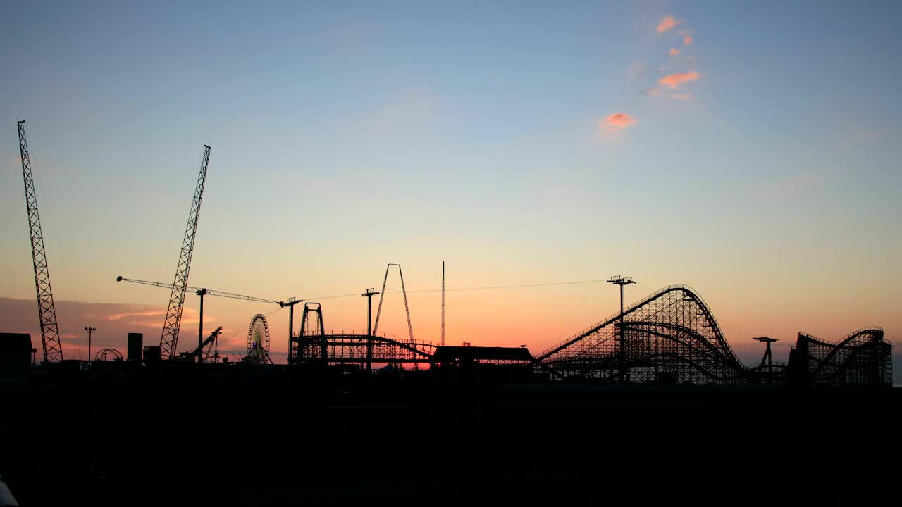 Download Free Video Stock Sunrise Above A Rollercoaster Live Wallpaper