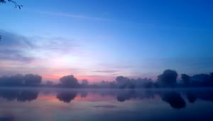 Free Video Stock sunrise with beautiful colors fog and the lake Live Wallpaper