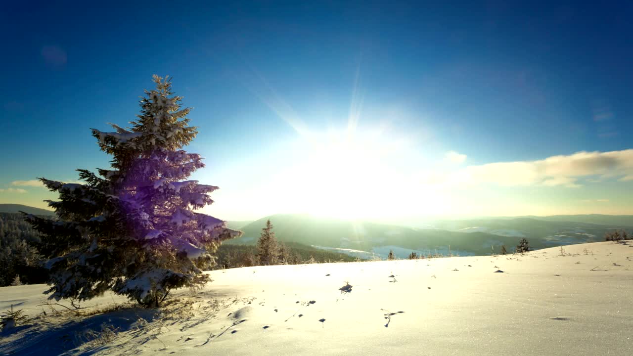 Download Free Video Stock sunset and dusk sunburst in the winter mountains Live Wallpaper
