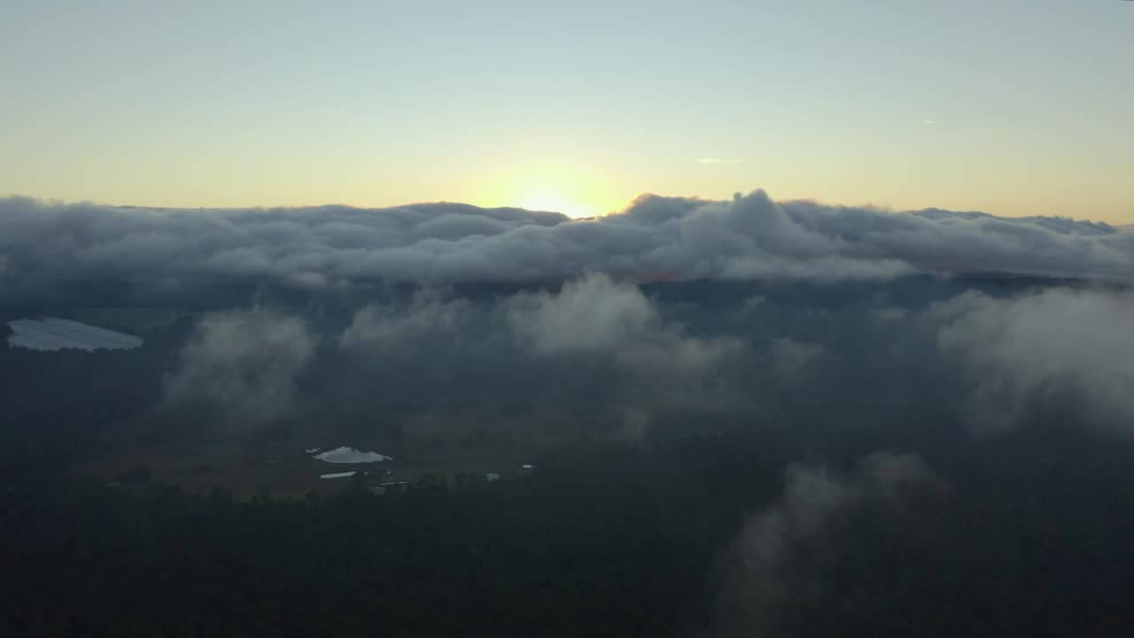 Download Free Video Stock sunset from the top of a cloudy mountain range Live Wallpaper