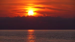Free Video Stock sunset in the clouds over the sea Live Wallpaper