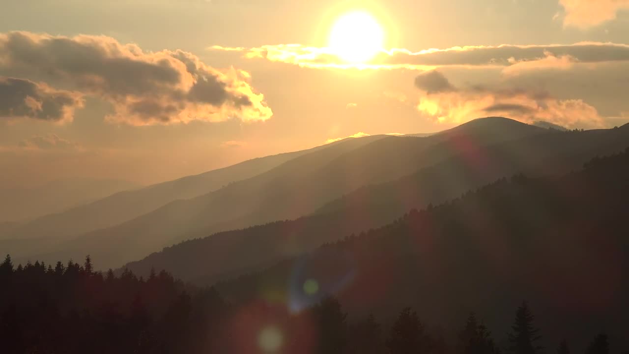 Download Free Video Stock sunset in the mountains seen from afar Live Wallpaper