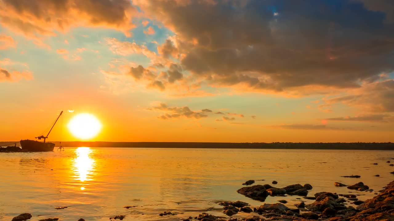 Download Free Video Stock sunset in the river with a boat Live Wallpaper