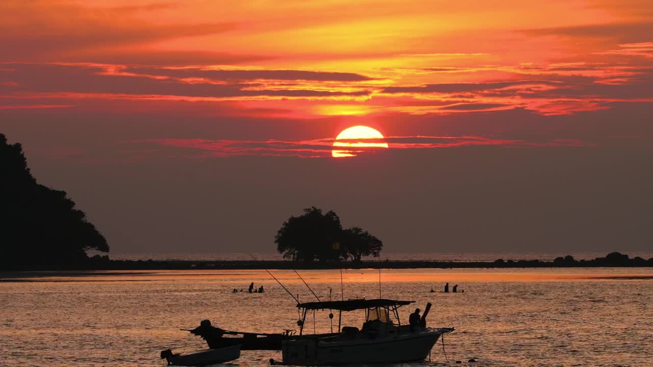 Download Free Video Stock sunset landscape with boats and trees Live Wallpaper