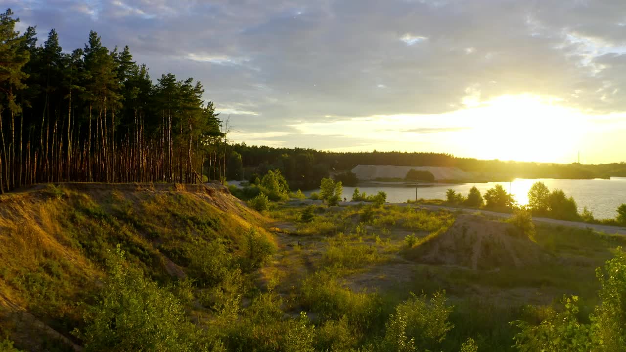 Download Free Video Stock sunset on a river next to a valley Live Wallpaper