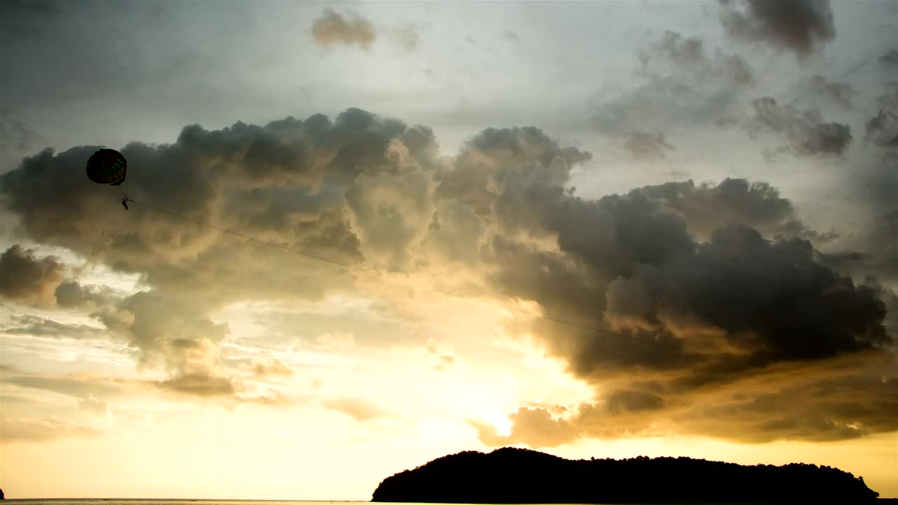 Download Free Video Stock sunset over a tropical island Live Wallpaper