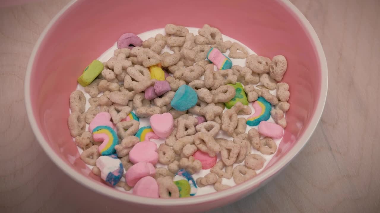 Download Free Video Stock sweetened cereal with marshmallows and milk in a bowl Live Wallpaper