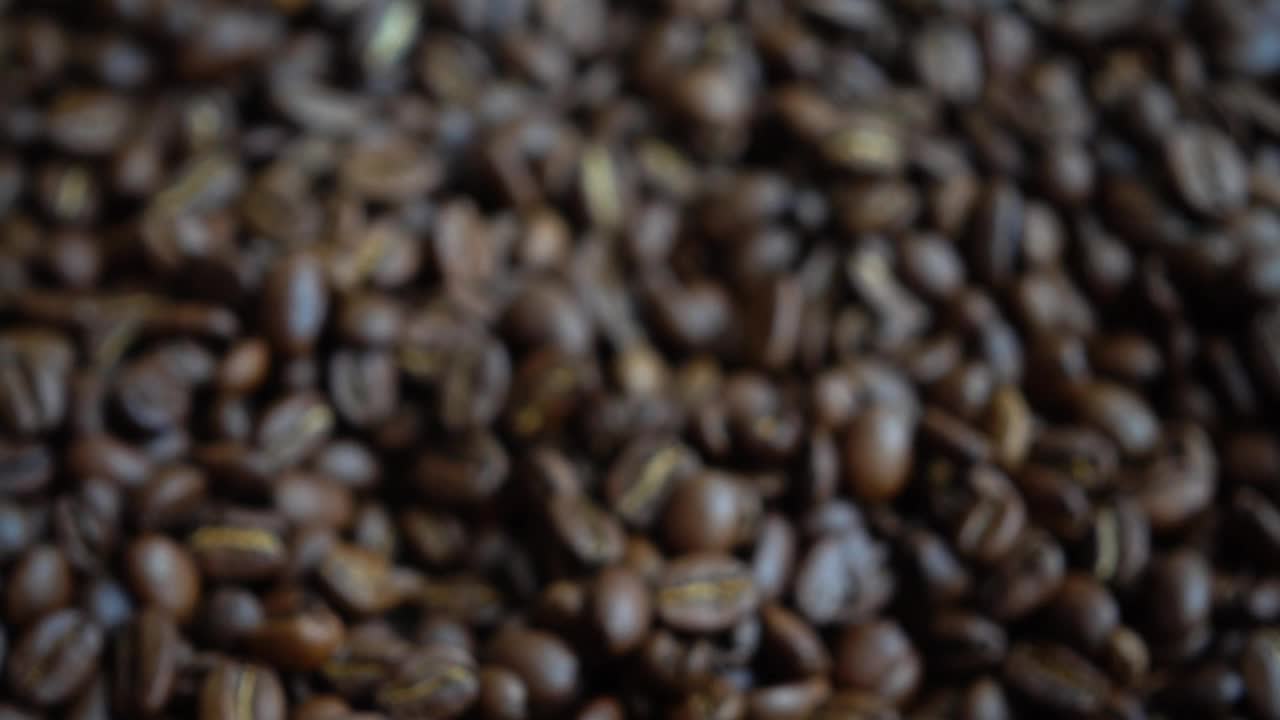 Download Free Video Stock taking a handful of coffee beans Live Wallpaper