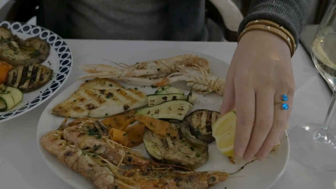 Download Free Video Stock taking a photo of seafood Live Wallpaper