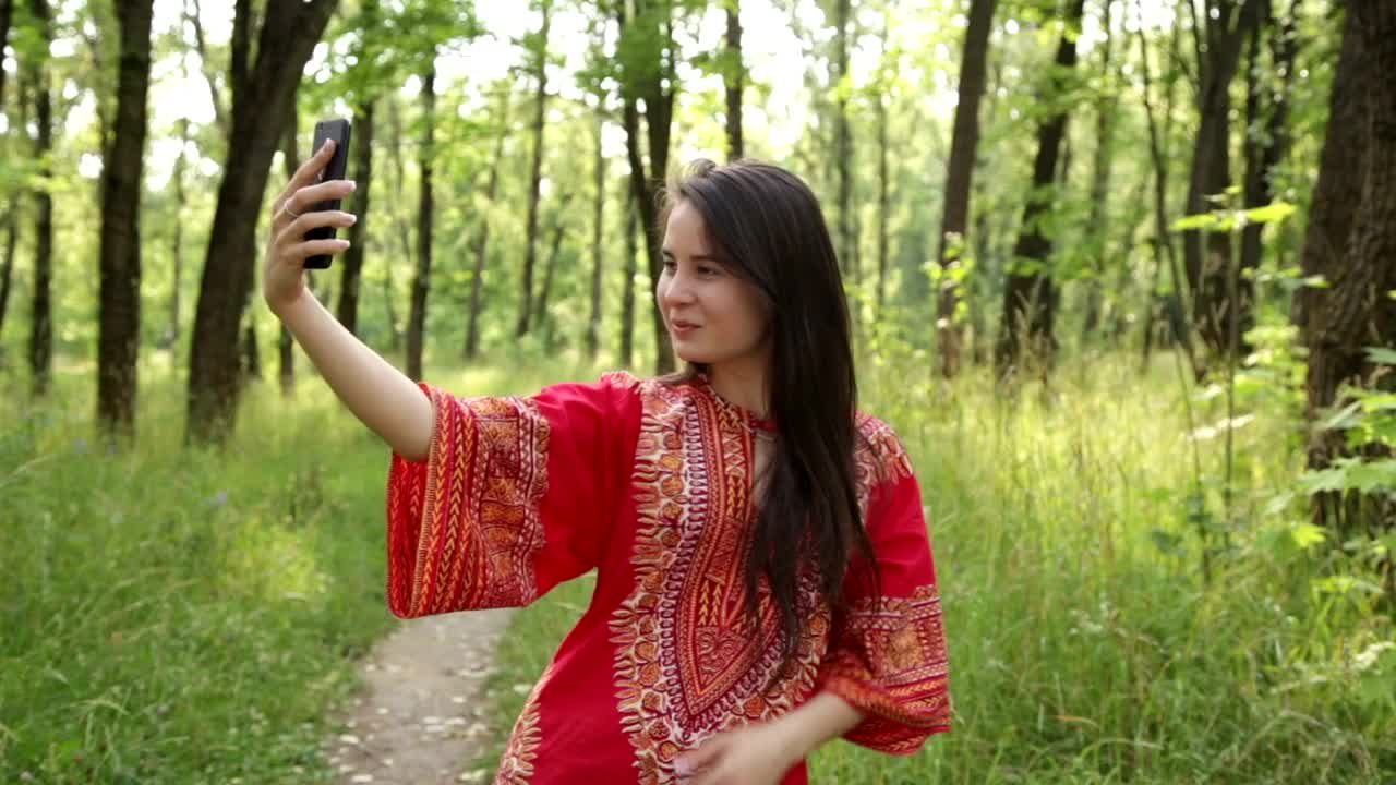 Download Free Video Stock taking a selfie in a forest Live Wallpaper