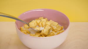 Download Free Video Stock taking a spoonful of cereal in the form of bread Live Wallpaper