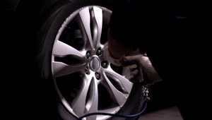 Free Video Stock taking a wheel off of a car Live Wallpaper