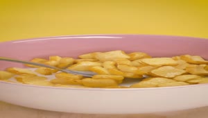 Free Video Stock taking cereal with milk from a bowl with a spoon Live Wallpaper
